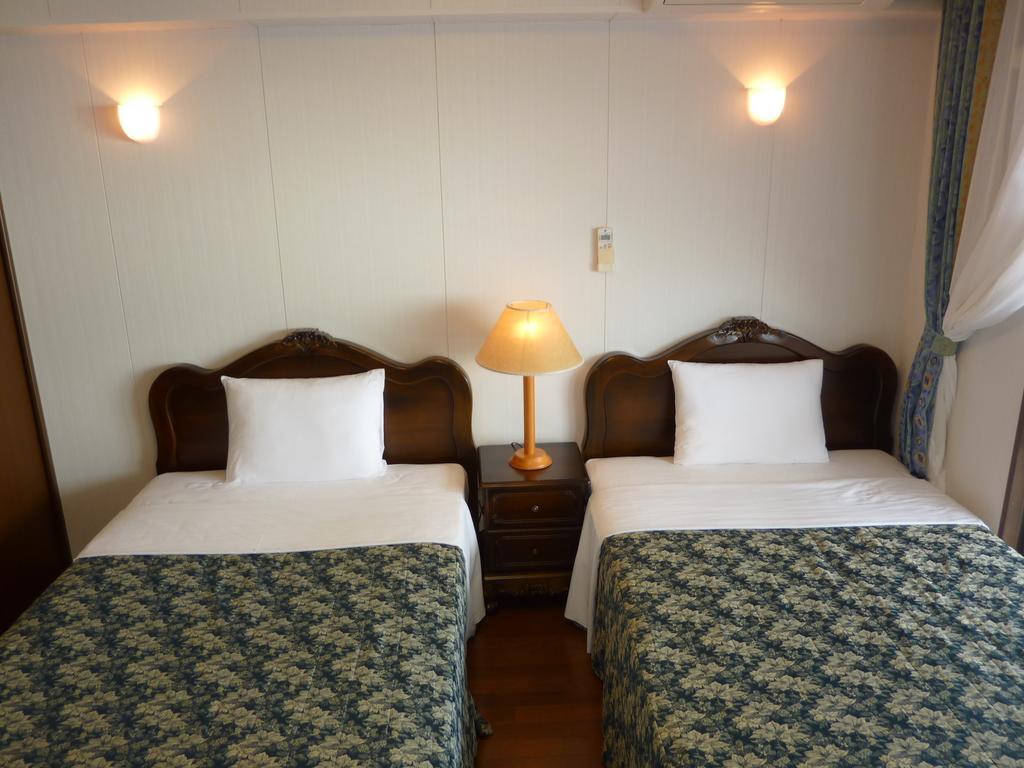 Morimar Resort Hotel Йомітан Номер фото