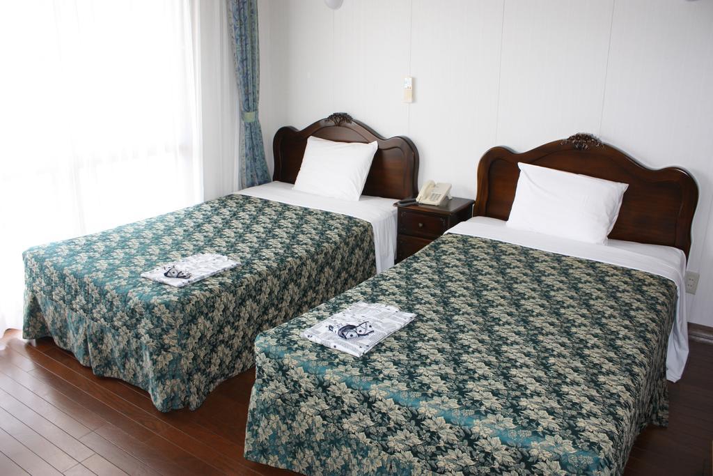 Morimar Resort Hotel Йомітан Номер фото